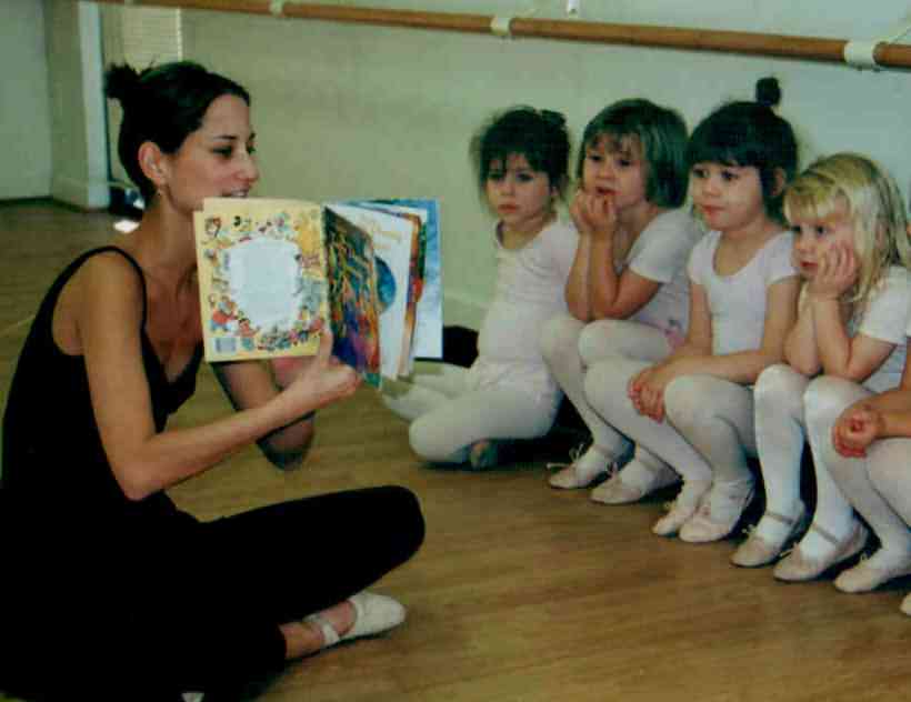 Rachel listens to storytime during dance class.